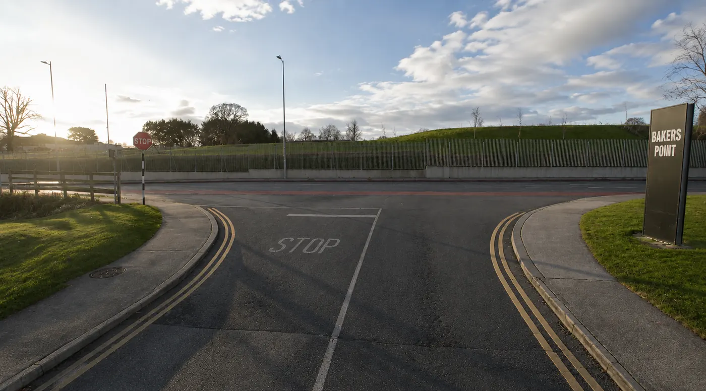 Exit from the Dún Laoghaire driving test centre at Bakers Point, showing the stop line and Bakers Point sign